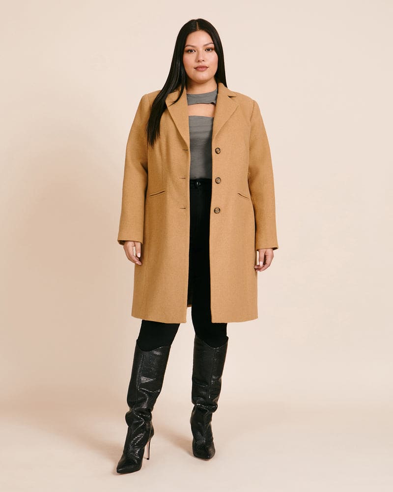 Front of a model wearing a size 12 Camel Hair Coat in Camel by Henning. | dia_product_style_image_id:224898